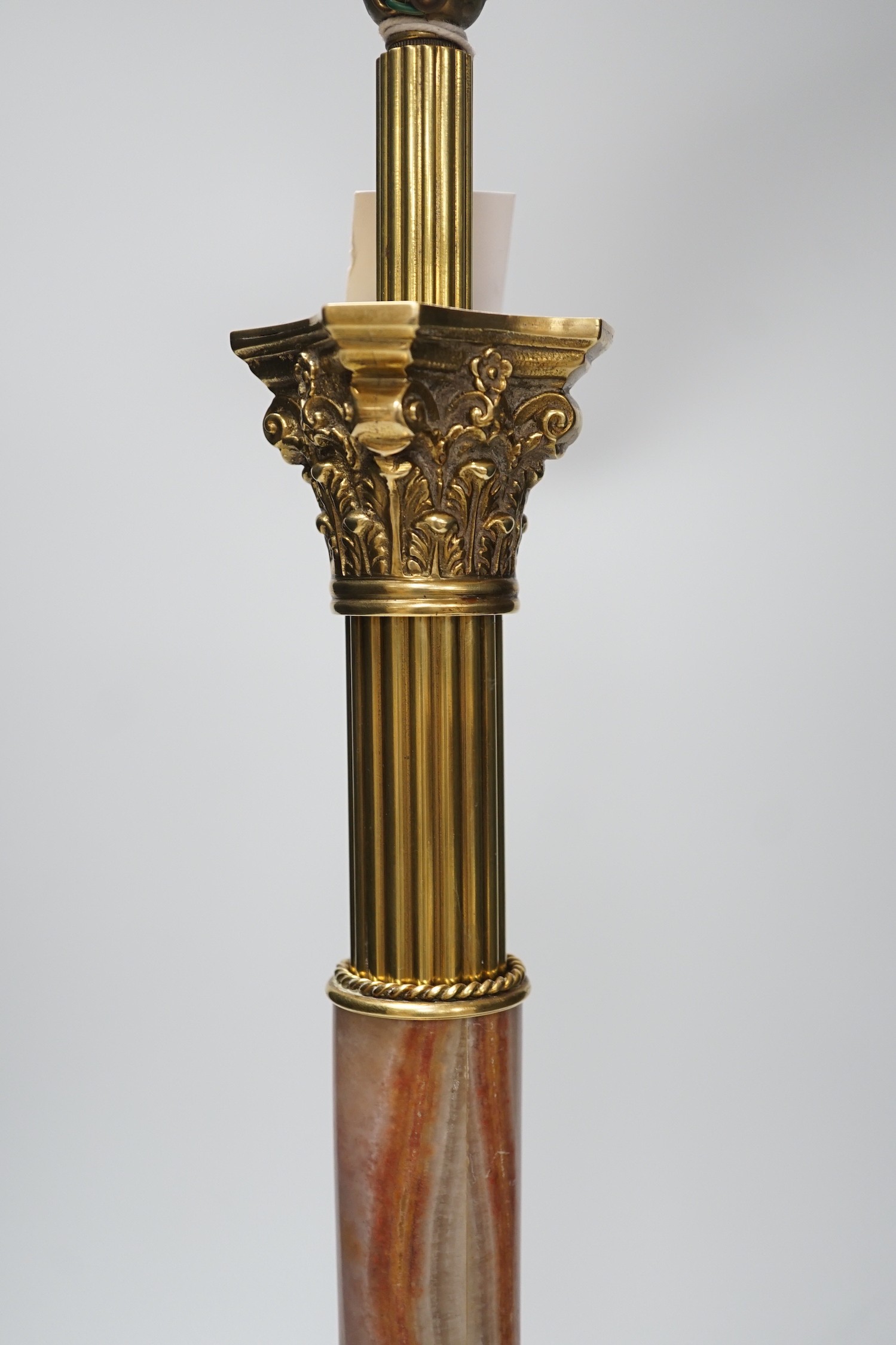 A brass and onyx Corinthian column table lamp, 55cm total height